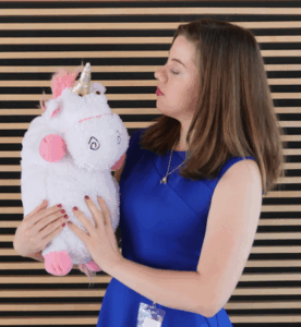 Author Geanna Culbertson holding a baby unicorn.